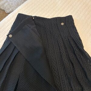Burberry Skirt, fitted with flare at bottom, size 38